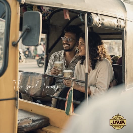 Friends sharing Java Lounge coffee in a tuk-tuk